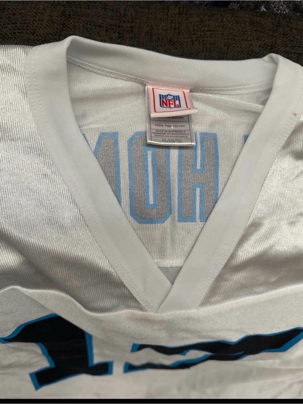 NFL White Football Jersey with Black and Light Blue Accents - Picture 2 of 3